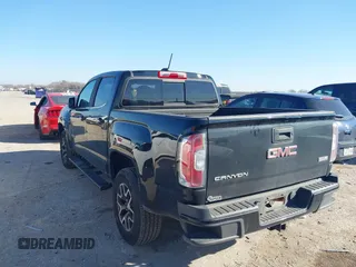 2016 GMC Canyon 4WD SLE with VIN 1GTG6CE30G1381435, listed as a IAAI auction lot 41642964 with 130,490 mi miles. Bid and sale history available at carsss.com. Image 3.