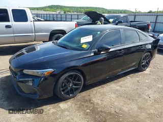 2023 Honda Civic Sport with VIN 2HGFE2F58PH557787, listed as a IAAI auction lot 42207827 with 51,885 mi miles and . Bid and sale history available at DreamBid. Image 17.