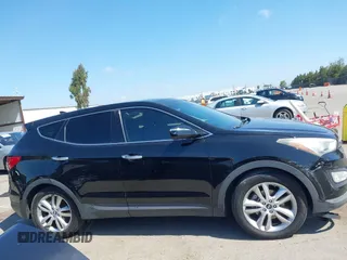 2013 Hyundai Santa Fe Sport z VIN 5XYZW3LA8DG037065, wystawiony jako IAAI lot #42139488 z przebiegiem 165 794 mil mil oraz . Historia ofert i sprzedaży dostępna na DreamBid. Obrazek 13.