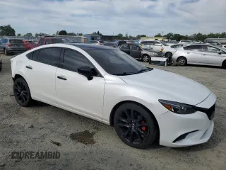 2017 Mazda 6 Grand Touring with VIN JM1GL1W51H1130289, listed as a Copart auction lot 52769205 with 82,155 mi miles and Salvage Title. Bid and sale history available at carsss.com. Image 4.