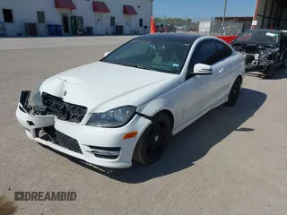 2015 Mercedes-Benz C-Class C 250 with VIN WDDGJ4HB1FG403788, listed as a IAAI auction lot 40495537 with 129,832 mi miles. Bid and sale history available at carsss.com. Image 17.