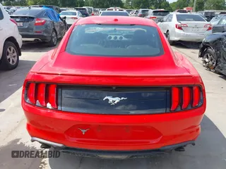 2020 Ford Mustang EcoBoost with VIN 1FA6P8THXL5111643, listed as a IAAI auction lot 42223704 with 59,170 mi miles and . Bid and sale history available at DreamBid. Image 16.
