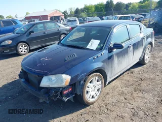 2014 Dodge Avenger SE z VIN 1C3CDZAB9EN144246, wystawiony jako IAAI lot #42145227 z przebiegiem 133 155 mil mil oraz . Historia ofert i sprzedaży dostępna na DreamBid. Obrazek 2.