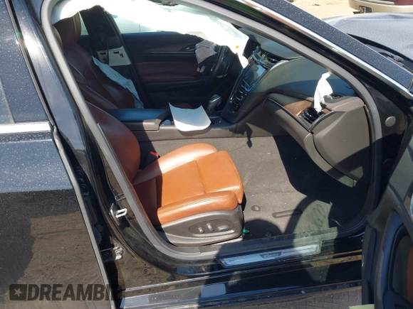 2014 Cadillac CTS Vsport Premium RWD z VIN 1G6AV5S81E0159352, wystawiony jako IAAI lot #41889600 z przebiegiem 94 859 mil mil oraz . Historia ofert i sprzedaży dostępna na DreamBid. Obrazek 5.