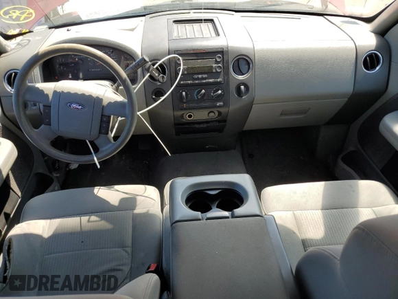 2007 Ford F-150 STX with VIN 1FTRX12W27FA38928, listed as a Copart auction lot 56470545 with 169,874 mi miles and Salvage title. Bid and sale history available at DreamBid. Image 8.