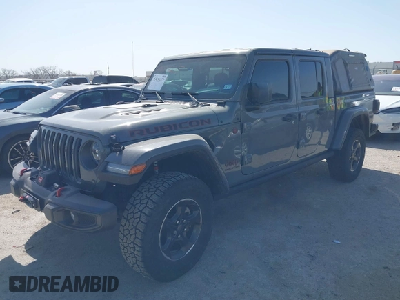 2022 Jeep Gladiator Rubicon z VIN 1C6JJTBG2NL167034, wystawiony jako IAAI lot #41854225 z przebiegiem Nie podano mil oraz . Historia ofert i sprzedaży dostępna na DreamBid. Obrazek 2.