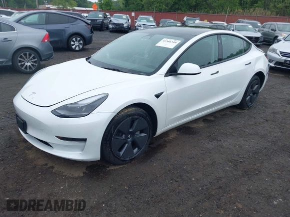 2023 Tesla Model 3 z VIN 5YJ3E1EA6PF570876, wystawiony jako IAAI lot #42366310 z przebiegiem 13 005 mil mil oraz . Historia ofert i sprzedaży dostępna na DreamBid. Obrazek 2.