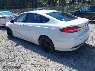 2018 Ford Fusion Hybrid SE with VIN 3FA6P0LU3JR226934, listed as a IAAI auction lot 42063065 with 126,683 mi miles. Bid and sale history available at carsss.com. Image 3.