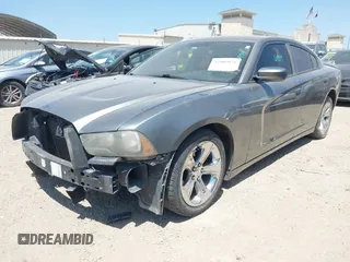 2012 Dodge Charger SE with VIN 2C3CDXBG5CH219805, listed as a IAAI auction lot 42002071 with 238,820 mi miles. Bid and sale history available at carsss.com. Image 2.
