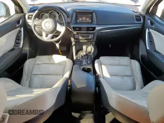 2016 Mazda CX-5 Grand Touring with VIN JM3KE2DY6G0668313, listed as a Copart auction lot 48353535 with 70,085 mi miles and Salvage Title. Bid and sale history available at carsss.com. Image 8.
