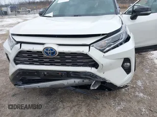 2021 Toyota RAV4 Hybrid XSE with VIN 4T3E6RFVXMU032368, listed as a IAAI auction lot 41358963 with 69,337 mi miles and . Bid and sale history available at DreamBid. Image 6.