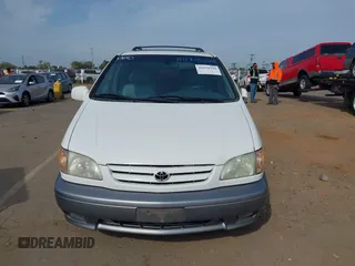 2002 Toyota Sienna LE with VIN 4T3ZF13CX2U506371, listed as a IAAI auction lot 42058440 with 215,434 mi miles. Bid and sale history available at carsss.com. Image 6.