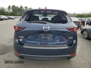 2018 Mazda CX-5 Touring with VIN JM3KFBCM9J0433729, listed as a Copart auction lot 49945515 with 143,064 mi miles and Salvage Title. Bid and sale history available at carsss.com. Image 6.