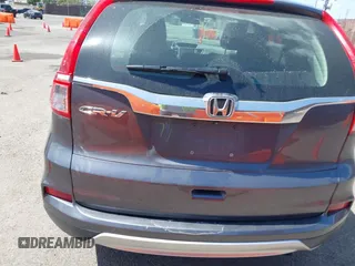 2015 Honda CR-V EX with VIN 3CZRM3H58FG711070, listed as a IAAI auction lot 41948788 with 140,130 mi miles and . Bid and sale history available at carsss.com. Image 16.