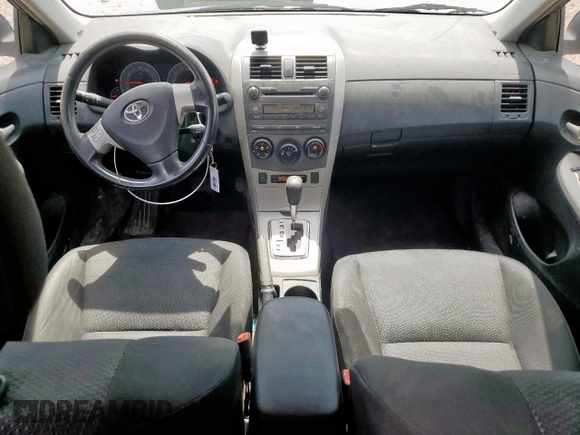 2010 Toyota Corolla z VIN 2T1BU4EE2AC497519, wystawiony jako Copart lot #64614915 z przebiegiem 183 890 mil mil oraz Szkoda całkowita • Salvage title. Historia ofert i sprzedaży dostępna na DreamBid. Obrazek 8.