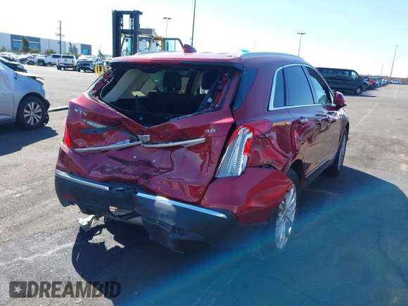 2019 Cadillac XT5 Premium Luxury FWD with VIN 1GYKNERS4KZ174349, listed as a IAAI auction lot 41614364 with 104,979 mi miles and . Bid and sale history available at DreamBid. Image 13.