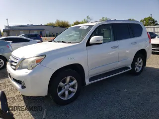 2010 Lexus GX 460 Premium with VIN JTJJM7FX6A5001418, listed as a Copart auction lot 52404285 with 169,065 mi miles and Salvage title. Bid and sale history available at DreamBid. Image 1.