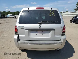 2005 Mercury Mariner Luxury z VIN 4M2YU56165DJ21260, wystawiony jako Copart lot #67528354 z przebiegiem Nie podano mil oraz Szkoda całkowita • Salvage title. Historia ofert i sprzedaży dostępna na DreamBid. Obrazek 6.