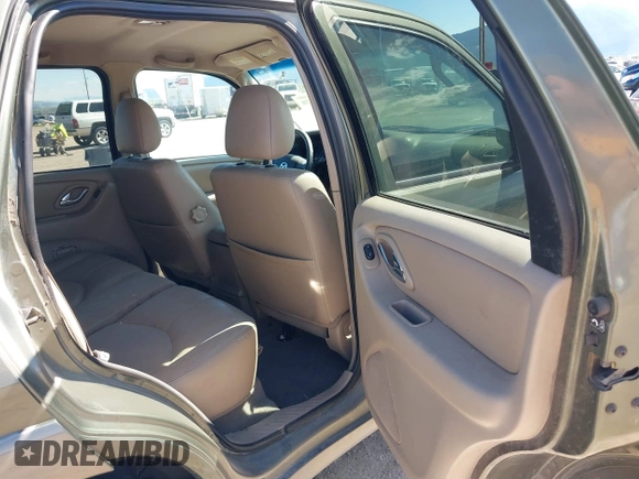 2002 Mazda Tribute LX with VIN 4F2CU08152KM02067, listed as a IAAI auction lot 42198970 with 212,613 mi miles and . Bid and sale history available at carsss.com. Image 8.