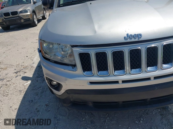 2012 Jeep Compass Sport with VIN 1C4NJCBA7CD660091, listed as a IAAI auction lot 42113038 with 123,181 mi miles. Bid and sale history available at carsss.com. Image 12.