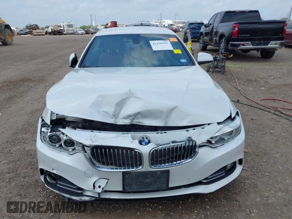 2015 BMW 4 Series 428i z VIN WBA3V5C53FP751805, wystawiony jako IAAI lot #42150102 z przebiegiem 113 381 mil mil oraz . Historia ofert i sprzedaży dostępna na DreamBid. Obrazek 12.