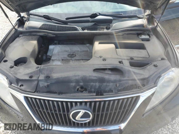 2011 Lexus RX 350 z VIN 2T2BK1BA6BC117715, wystawiony jako Copart lot #55993135 z przebiegiem 222 665 mil mil oraz Szkoda całkowita • Salvage title. Historia ofert i sprzedaży dostępna na DreamBid. Obrazek 12.