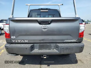 2018 Nissan Titan SV with VIN 1N6AA1E50JN514802, listed as a Copart auction lot 62342875 with 101,593 mi miles and Salvage title. Bid and sale history available at DreamBid. Image 6.