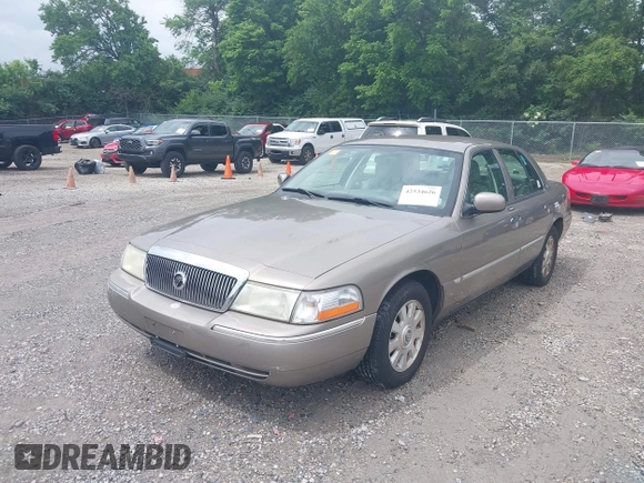 2005 Mercury Grand Marquis LS Premium z VIN 2MEFM75W25X661590, wystawiony jako IAAI lot #42534626 z przebiegiem 113 450 mil mil oraz . Historia ofert i sprzedaży dostępna na DreamBid. Obrazek 2.