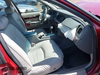 2002 Mercury Grand Marquis LS Premium z VIN 2MEFM75W22X653775, wystawiony jako IAAI lot #42225138 z przebiegiem 124 749 mil mil oraz . Historia ofert i sprzedaży dostępna na DreamBid. Obrazek 5.