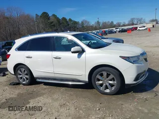 2014 Acura MDX Advance with VIN 5FRYD4H84EB001636, listed as a IAAI auction lot 41644117 with 124,460 mi miles and . Bid and sale history available at carsss.com. Image 14.