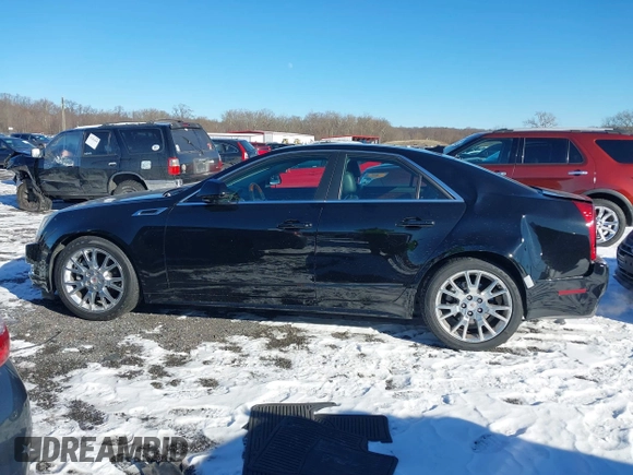 2013 Cadillac CTS Premium z VIN 1G6DS5E34D0160676, wystawiony jako IAAI lot #41262795 z przebiegiem 122 248 mil mil oraz . Historia ofert i sprzedaży dostępna na DreamBid. Obrazek 14.