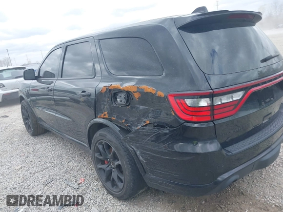 2021 Dodge Durango SRT Hellcat with VIN 1C4SDJH91MC682235, listed as a IAAI auction lot 42029380 with 9,921 mi miles and . Bid and sale history available at DreamBid. Image 14.