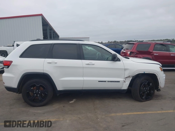2018 Jeep Grand Cherokee Laredo E with VIN 1C4RJFAG2JC503130, listed as a IAAI auction lot 41527333 with 95,669 mi miles. Bid and sale history available at carsss.com. Image 13.