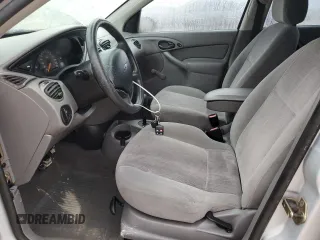 2000 Ford Focus SE with VIN 1FAFP36P2YW348280, listed as a Copart auction lot 55479335 with 53,172 mi miles and Salvage title. Bid and sale history available at DreamBid. Image 7.