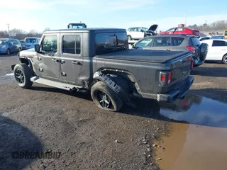 2022 Jeep Gladiator Texas Trail with VIN 1C6HJTAG7NL141819, listed as a IAAI auction lot 41520083 with 21,191 mi miles and . Bid and sale history available at DreamBid. Image 3.