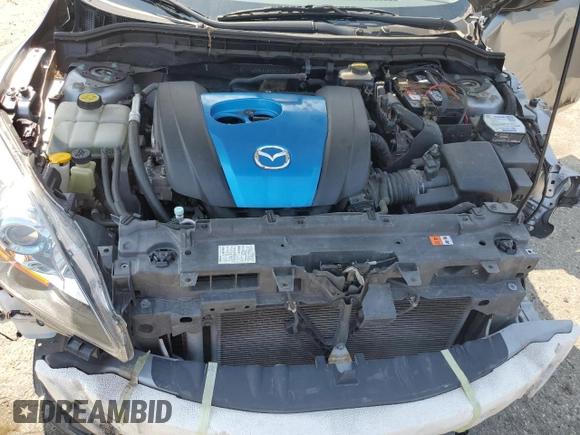 2012 Mazda 3 i Touring with VIN JM1BL1L84C1700805, listed as a Copart auction lot 61865075 with 77,538 mi miles and Salvage title. Bid and sale history available at DreamBid. Image 12.