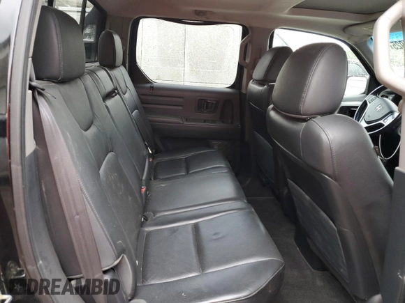 2012 Honda Ridgeline RTL with VIN 5FPYK1F5XCB455246, listed as a Copart auction lot 52871925 with 179,755 mi miles and Salvage title. Bid and sale history available at DreamBid. Image 11.