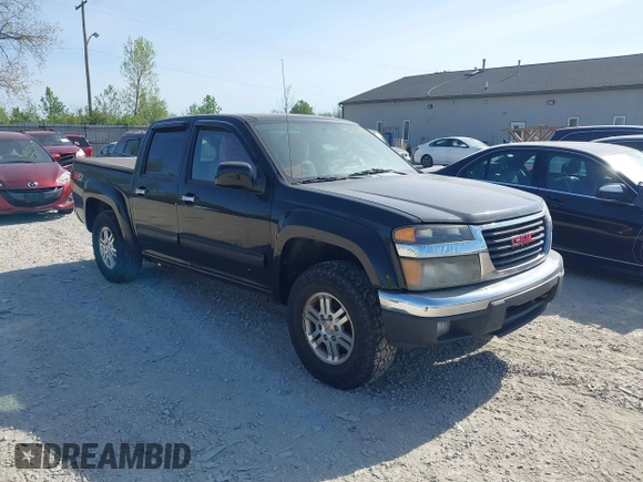 2011 GMC Canyon SLE1 with VIN 1GTH6MFE5B8104838, listed as a IAAI auction lot 42120959 with 188,277 mi miles. Bid and sale history available at carsss.com. Image 1.