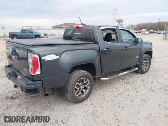 2016 GMC Canyon 4WD SLE with VIN 1GTG6CE38G1165896, listed as a IAAI auction lot 40716621 with 116,684 mi miles. Bid and sale history available at carsss.com. Image 4.