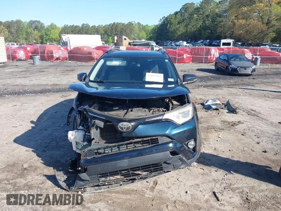 2018 Toyota RAV4 XLE with VIN JTMWFREV5JJ739619, listed as a IAAI auction lot 42017343 with 126,810 mi miles and . Bid and sale history available at DreamBid. Image 13.