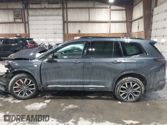 2022 Cadillac XT6 Sport with VIN 1GYKPGRS2NZ164879, listed as a IAAI auction lot 41555242 with 10,862 mi miles. Bid and sale history available at carsss.com. Image 14.