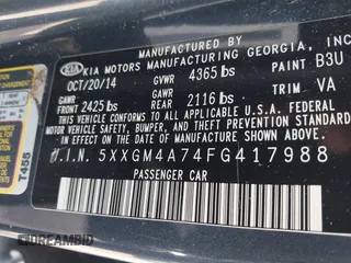 2015 Kia Optima LX with VIN 5XXGM4A74FG417988, listed as a IAAI auction lot 41805916 with 135,000 mi miles. Bid and sale history available at carsss.com. Image 9.