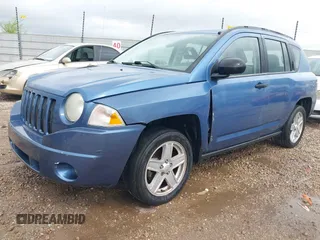 2007 Jeep Compass Sport with VIN 1J8FT47W57D215243, listed as a IAAI auction lot 41925203 with 255,193 mi miles. Bid and sale history available at carsss.com. Image 2.
