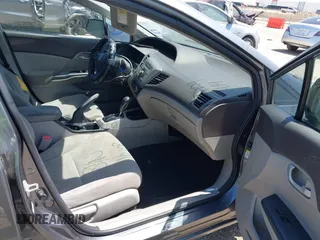 2012 Honda Civic LX z VIN 19XFB2F57CE012290, wystawiony jako IAAI lot #42030870 z przebiegiem 191 886 mil mil oraz . Historia ofert i sprzedaży dostępna na DreamBid. Obrazek 5.