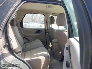 2003 Ford Escape XLS Popular with VIN 1FMYU02153KB46301, listed as a IAAI auction lot 41793418 with 188,184 mi miles. Bid and sale history available at carsss.com. Image 8.
