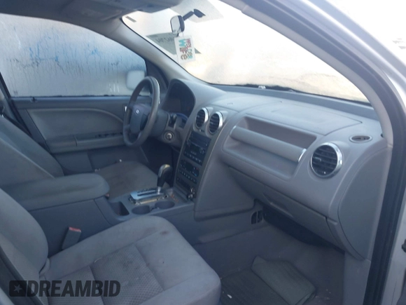 2005 Ford Freestyle SE with VIN 1FMZK01165GA52333, listed as a IAAI auction lot 41062704 with 234,459 mi miles. Bid and sale history available at carsss.com. Image 5.