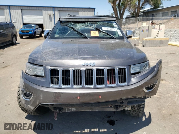 2014 Jeep Grand Cherokee Limited with VIN 1C4RJFBM3EC384398, listed as a Copart auction lot 57703835 with 153,255 mi miles and Salvage title. Bid and sale history available at DreamBid. Image 5.