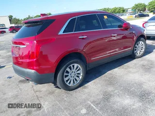 2019 Cadillac XT5 FWD with VIN 1GYKNARS9KZ173920, listed as a IAAI auction lot 42321141 with Not provided miles and . Bid and sale history available at DreamBid. Image 4.