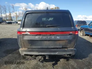 2022 Rivian R1S Launch Edition with VIN 7PDSGABL1NN000514, listed as a Copart auction lot 77444184 with 29,490 mi miles and Salvage Title. Bid and sale history available at DreamBid. Image 6.