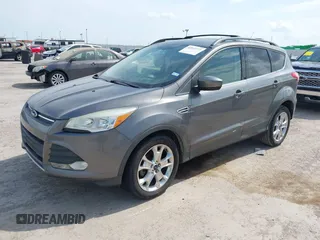 2013 Ford Escape SE with VIN 1FMCU0GXXDUD85470, listed as a IAAI auction lot 42142774 with 145,391 mi miles. Bid and sale history available at carsss.com. Image 2.